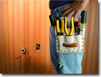 Image of electrician and toolbelt